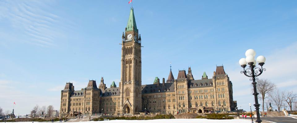 Photo of the Canadian Parliament buildings in winter